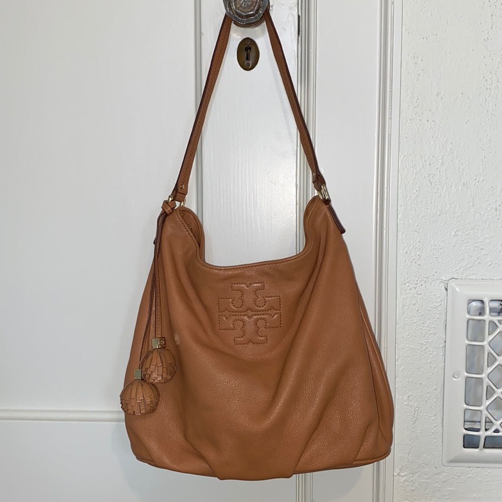Never worn- Tory Burch Thea Pebbled Hobo bag with Pom Pom Tassels-